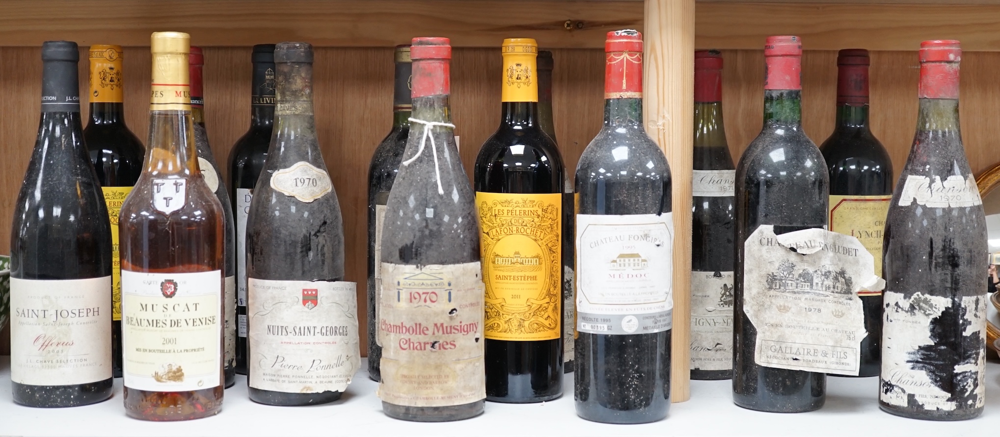 Fifteen various bottles of French wines to include 1970 Nuits-Saint-Georges Pierre Ponnelle, Domaine De Cantaussel Pic St.Martin 2004, etc. Condition - storage unknown